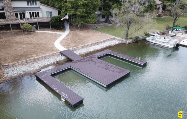 A custom made dock floating on a lake