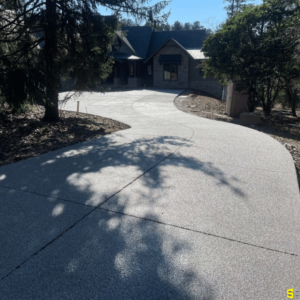 The finished concrete walkway up to a residential home