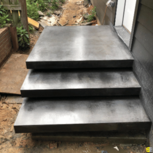 A close up of freshly made concrete steps