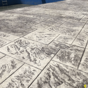 A close up of a marble concrete walkway completed