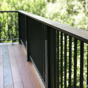 The finished railings attached to a wooden deck