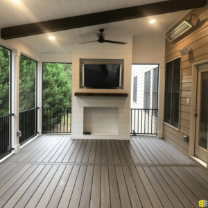 An outdoor, enclosed patio with a small fireplace, a flat screen tv mounted above it