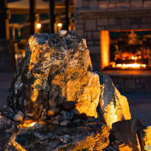 A decorative stone cast with warm outdoor light